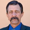 John Marrs as Mr. Plaxton