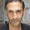 Omar Alex Khan as Cop