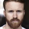 Paddy Wallace as DP Camp Sentry