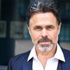 Michael Dickson as Professor Piers Olsen
