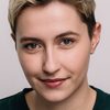 Charis Storms as Izzy(Charis Beth Swartley)