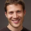 Zach Gilford as Adam Davies
