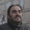 Lambros Apostolou as Grocer