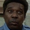 John McCurry as Junkie / Guard #1