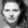 Charlie May-Clark as Illisa (as Charlie Clark)