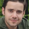 Dan Burman as Greg - Centipede #7
