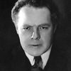 Jules Epailly as Louis, Headwaiter