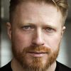 Olly Bassi as SS Colonel Maximilian Schtacker
