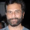Pavan Malhotra as Milkha Singh's Coach / Gurudev Singh