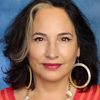 Cristina Frias as Lobby Parent