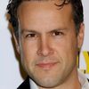 Noah Blake as Russ Grisset