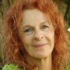 Nomi Sharron as Feather Woman