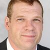 Glenn Jacobs as Kane