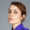 Noomi Rapace as Caroline Edh