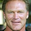 Brian Bosworth as Coach Hagbart