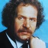 Mort Shuman as Officer Ron Miglioriti