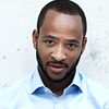 Romaine Waite as Greg Cole
