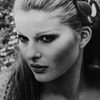 Simonetta Stefanelli as 'Giugi' Santenocito
