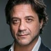 Enrique Arce as Carlos Rodriguez