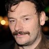 Julian Barratt as Tony Iscariot