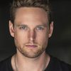 Michael Patrick Lane as Charlie