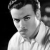 Nils Asther as Norman