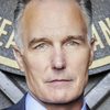 Patrick St. Esprit as Secretary of Defense Tanner