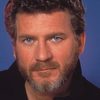 Robert Foxworth as Wayne Woodson