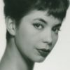Margit Carlqvist as Nelly Bro