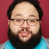 Zach Cherry as Dennis