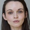 Reyna de Courcy as Karen