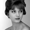 Marie-Hélène Arnaud as Girl at Maxim's (uncredited)