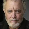Bob McCracken as Simmons