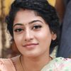 Anjali Nair as Meenakshi's Mother
