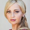Tara Strong as Raven (voice)