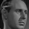 Vernon Downing as Reporter Logan