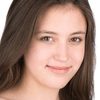 Sydney Freihofer as Tia