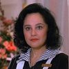 Divina Cook as Mrs. Boudreaux