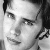 John Keefe as Julian Garrison