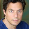 Bruce Ramsay as Simon Burke