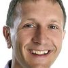 Rory Morrison as Radio Newsreader