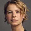 Jessie Buckley as Young Woman