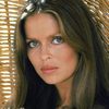 Barbara Bach as Journalist