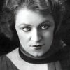 Germaine Lix as La chanteuse