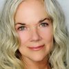Blaire Baron as Carolyn Sykes