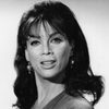 Marie Gomez as Nola