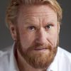 Rune Temte as Bjørn the Norwegian Coach