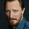 John Hoogenakker as Tim Smith