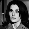 Lara Lindsay as The Woman Runner