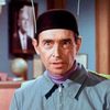 Tim Herbert as Gas Station Attendant